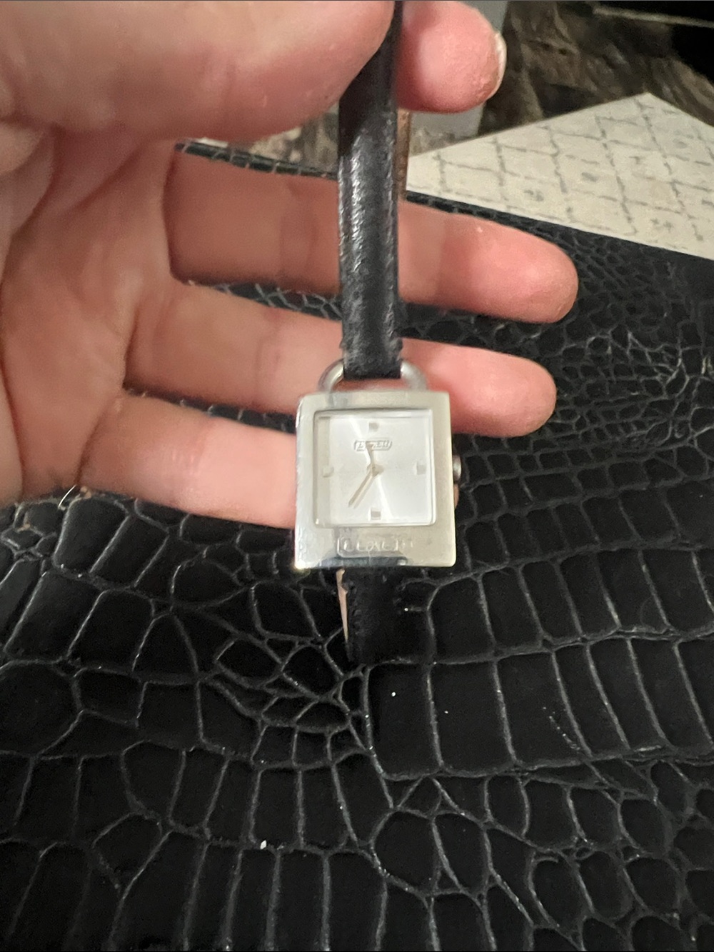 Coach skinny strap wrap around watch.